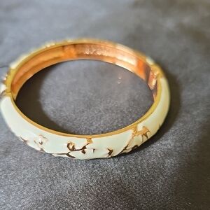 Elegant Hinged Gold and Cream Floral Bangle